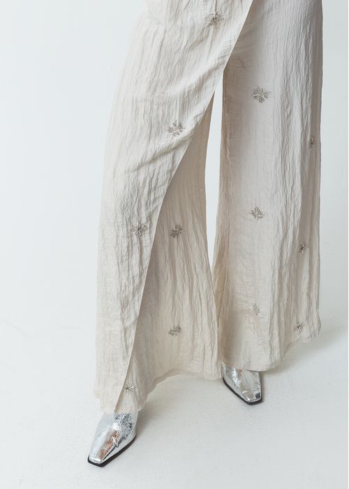 Pantalón de diseño cruzado