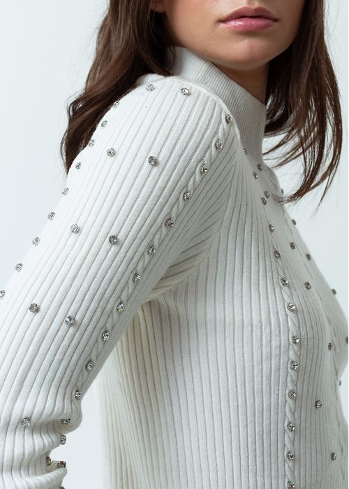 Buzo tejido con apliques brillantes