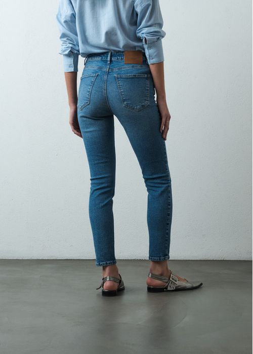 Jean Skinny tiro súper alto tono claro