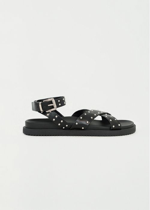 Sandalias con taches